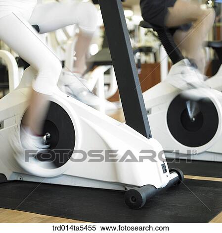 exercising people at a fitness club View Large Photo Image Stock Photography - exercising people at a fitness club. Fotosearch