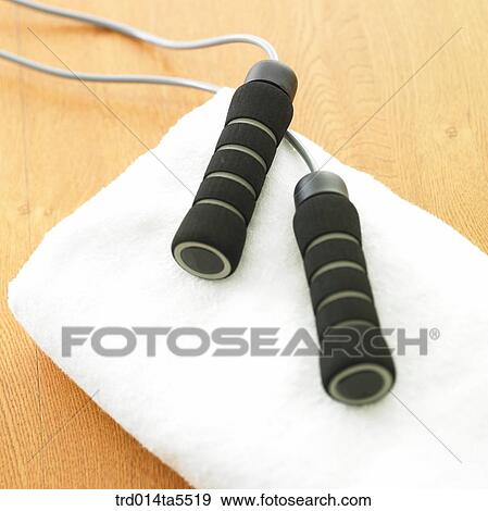 sport goods, a rope and a towel View Large Photo Image Stock Photo - sport goods, a rope and a towel. Fotosearch