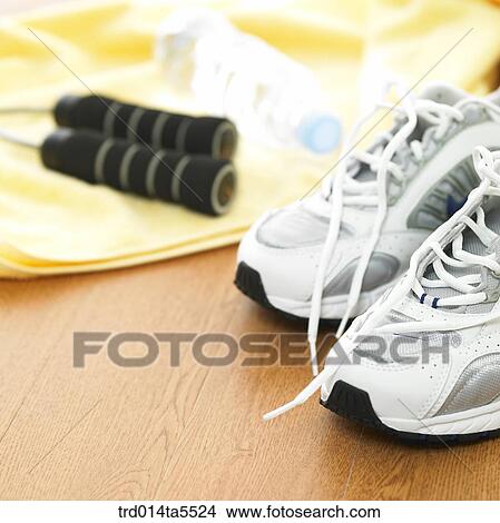 sport goods and a sports shoe View Large Photo Image Picture - sport goods and a sports shoe. Fotosearch