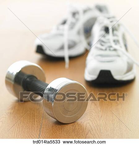 Stock Image - sport goods and a sports shoe. Fotosearch