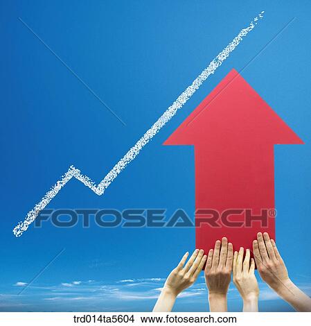 business concept/a businessman and a businesswoman holding an arrow View Large Photo Image Picture - business concept/a businessman and a businesswoman holding an arrow. Fotosearch