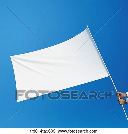 Stock Image - business concept/a businessman holding a white flag. Fotosearch