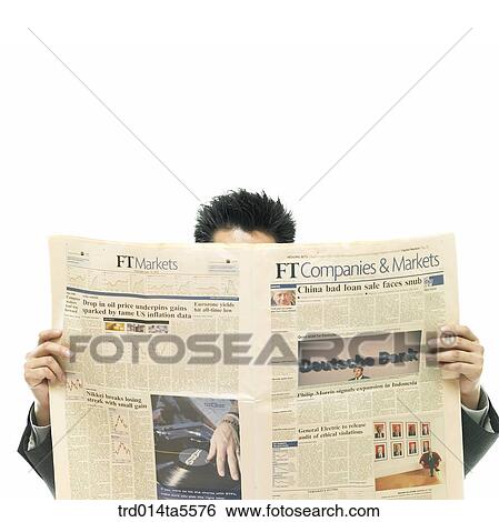 business concept/a businessman looking a newspaper View Large Photo Image Stock Photograph - business concept/a businessman looking a newspaper. Fotosearch