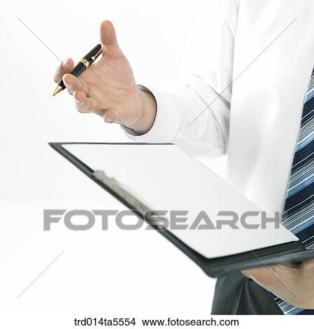 business concept/a businessman's hand holding a circulation board View Large Photo Image Picture - business concept/a businessman's hand holding a circulation board. Fotosearch