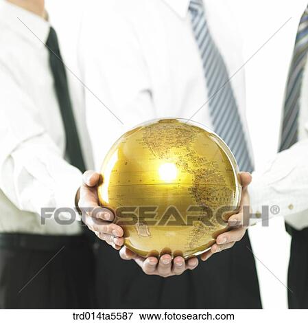 business concept/holding a globe View Large Photo Image Stock Photo - business concept/holding a globe. Fotosearch