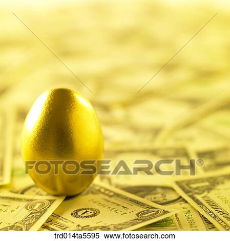 finance/a golden egg on a paper money View Large Photo Image Stock Photography - finance/a golden egg on a paper money. Fotosearch