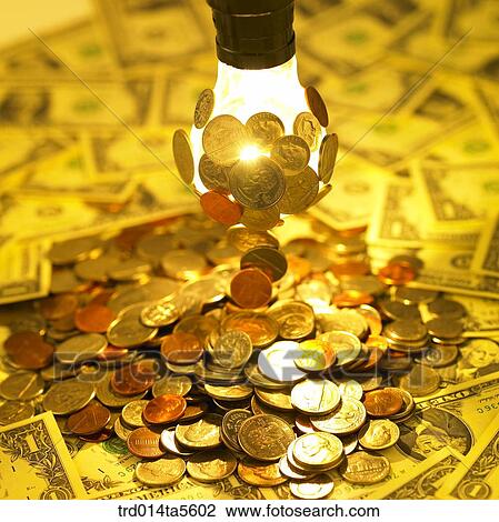 finance/coins and paper money on a bulb View Large Photo Image Stock Image - finance/coins and paper money on a bulb. Fotosearch