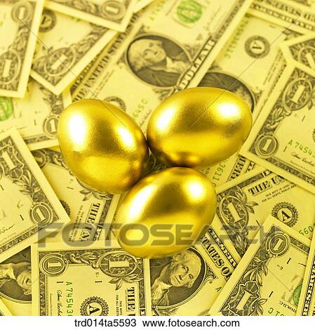 finance/golden eggs on a paper money View Large Photo Image Stock Image - finance/golden eggs on a paper money. Fotosearch