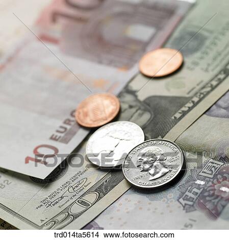 Picture - finance/paper money and coins. Fotosearch