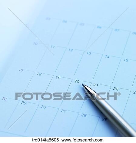 Stock Photography - office things/a calendar and a pen. Fotosearch