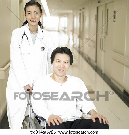 medicine/ a dentist and a patient on a wheelchair View Large Photo Image Stock Photography - medicine/ a dentist and a patient on a wheelchair. Fotosearch