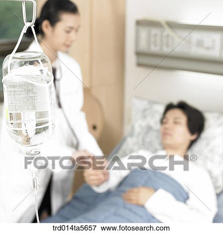Stock Photo - medicine/ a doctor and a patient. Fotosearch