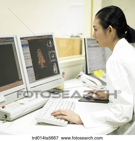 medicine/ a doctor and a patient looking at MRI pictures View Large Photo Image Stock Photo - medicine/ a doctor and a patient looking at MRI pictures. Fotosearch
