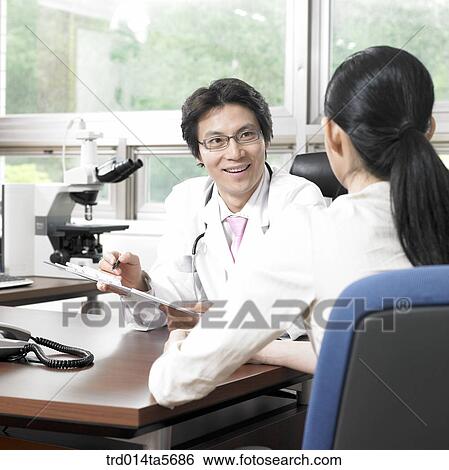 medicine/ a doctor and a patient View Large Photo Image Stock Photograph - medicine/ a doctor and a patient. Fotosearch