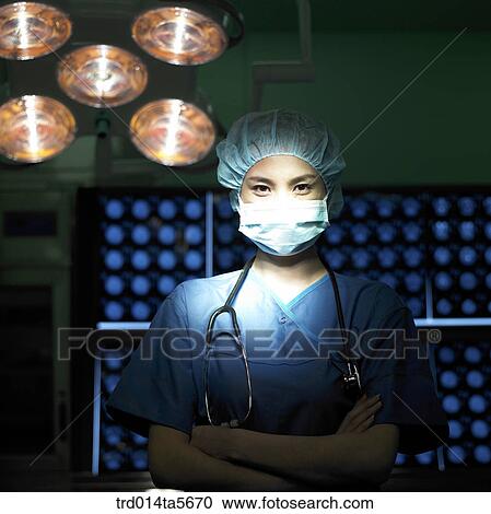 medicine/ a doctor in an operating room View Large Photo Image Stock Image - medicine/ a doctor in an operating room. Fotosearch