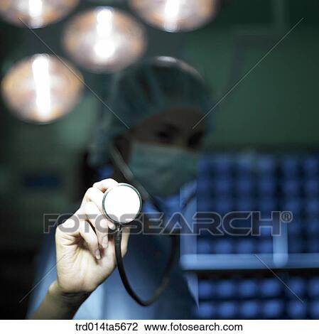 Stock Image - medicine/ a doctor with a stethoscope. Fotosearch