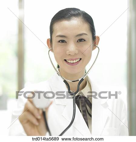 medicine/ a doctor with a stethoscope View Large Photo Image Stock Photo - medicine/ a doctor with a stethoscope. Fotosearch