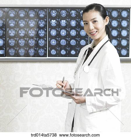 medicine/ a doctor writing a medical chart View Large Photo Image Stock Photo - medicine/ a doctor writing a medical chart. Fotosearch
