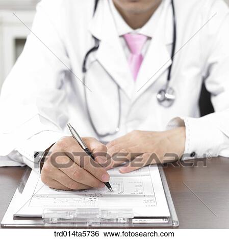 medicine/ a doctor writing a medical chart View Large Photo Image Stock Photograph - medicine/ a doctor writing a medical chart. Fotosearch