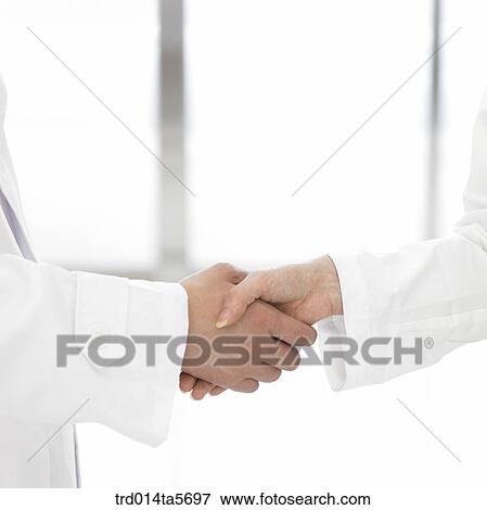 medicine/ doctors shaking hands View Large Photo Image Stock Photo - medicine/ doctors shaking hands. Fotosearch