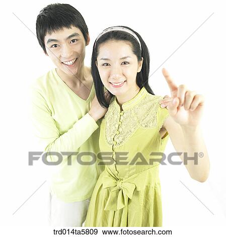 a couple taking a picture View Large Photo Image Stock Photo - a couple taking a picture. Fotosearch