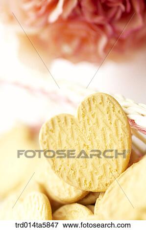 a heart-shaped snack View Large Photo Image Stock Photo - a heart-shaped snack. Fotosearch