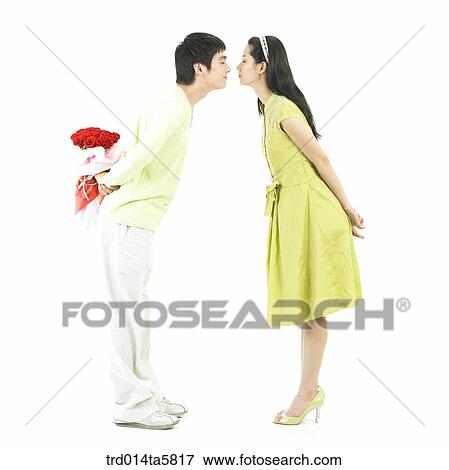 a kissing couple View Large Photo Image Stock Photo - a kissing couple. Fotosearch