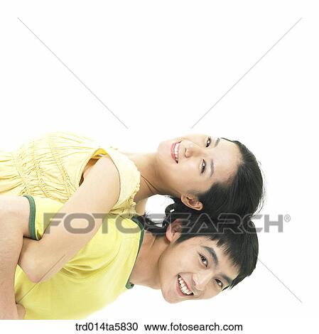 Stock Image - a playing couple. Fotosearch