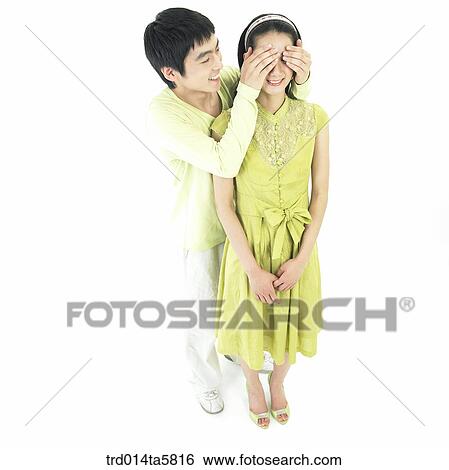 Stock Photograph - a playing couple. Fotosearch
