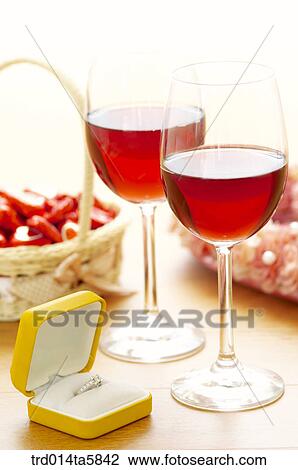 a wine glass and a couple of rings View Large Photo Image Stock Image - a wine glass and a couple of rings. Fotosearch
