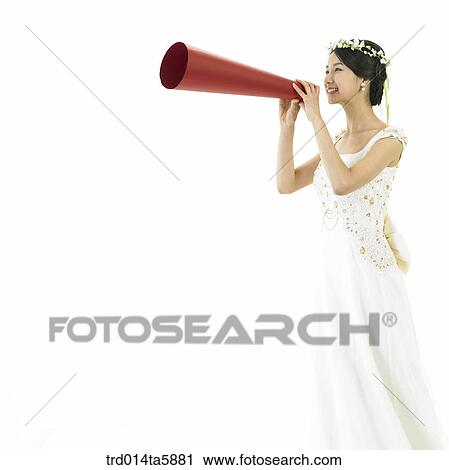 a bride holding a speaker View Large Photo Image Stock Image - a bride holding a speaker. Fotosearch