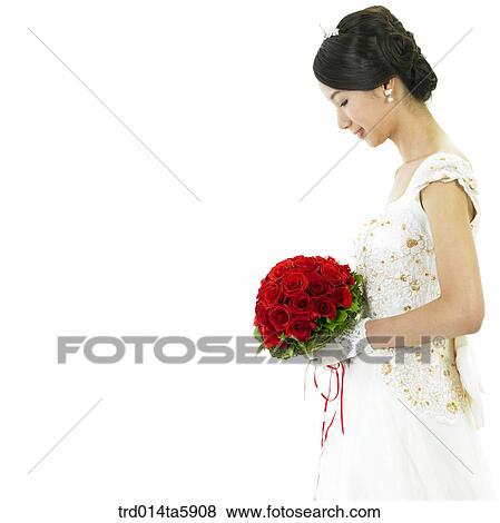 a bride with a bouquet View Large Photo Image Stock Photo - a bride with a bouquet. Fotosearch