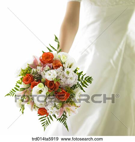 Stock Photo - a bride with a bouquet. Fotosearch