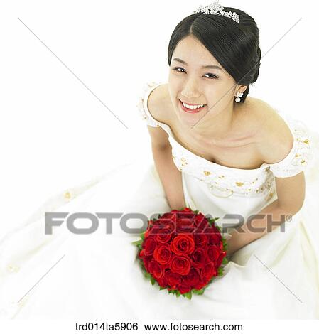 a bride with a bouquet View Large Photo Image Stock Photograph - a bride with a bouquet. Fotosearch