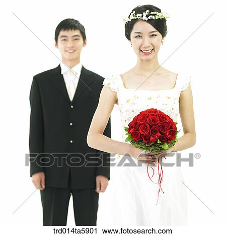 Stock Image - a bridegroom and a bride. Fotosearch
