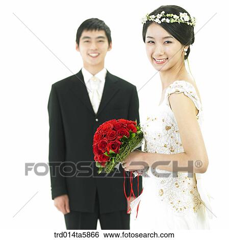 Stock Photograph - a bridegroom and a bride. Fotosearch