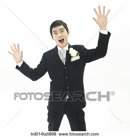 a bridegroom raising his hands View Large Photo Image Stock Photo - a bridegroom raising his hands. Fotosearch