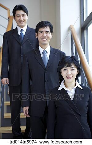 Picture - a businessman and a businesswoman . Fotosearch