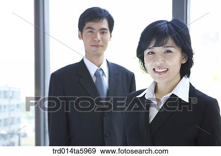 a businessman and a businesswoman View Large Photo Image Stock Photo - a businessman and a businesswoman . Fotosearch