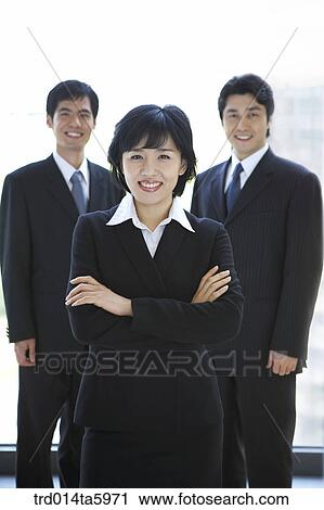 a businessman and a smiling businesswoman View Large Photo Image Stock Image - a businessman and a smiling businesswoman. Fotosearch