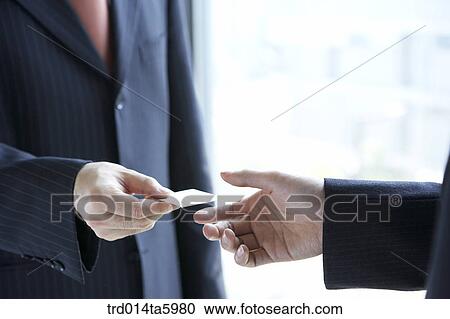 a businessman giving his namecard View Large Photo Image Stock Image - a businessman giving his namecard. Fotosearch