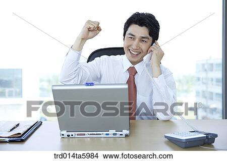 a calling businessman View Large Photo Image Picture - a calling businessman. Fotosearch