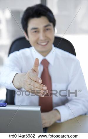 a hands-shaking businessman View Large Photo Image Stock Image - a hands-shaking businessman . Fotosearch
