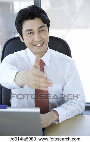 a hands-shaking businessman View Large Photo Image Stock Image - a hands-shaking businessman . Fotosearch