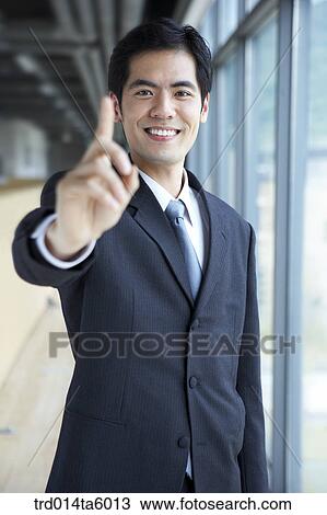 a smiling businessman View Large Photo Image Stock Image - a smiling businessman. Fotosearch