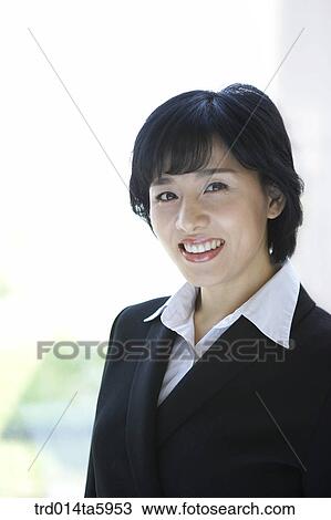 a smiling businesswoman View Large Photo Image Stock Image - a smiling businesswoman. Fotosearch
