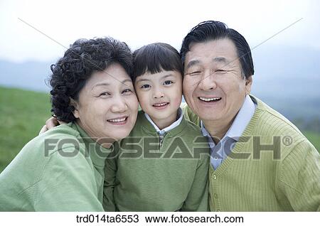 Stock Image - family, day, daytime, old, Asian, person. Fotosearch
