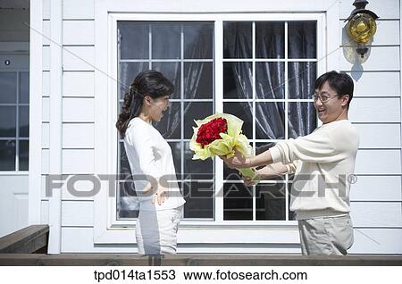 family, feeling, bouquet, day, daytime, Asian View Large Photo Image Stock Image - family, feeling, bouquet, day, daytime, Asian. Fotosearch