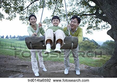 family, swing, day, daytime, play, toy View Large Photo Image Stock Image - family, swing, day, daytime, play, toy. Fotosearch