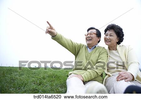 pointing, family, day, daytime, Asian, couple View Large Photo Image Stock Image - pointing, family, day, daytime, Asian, couple. Fotosearch